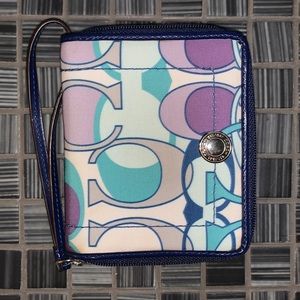 Coach Wristlet Wallet w/ Strap. Coach “C” Pattern in blue, purple, and green.